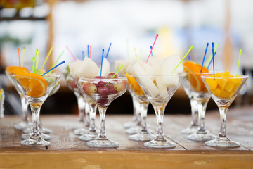 Fresh fruit cuts in champagne glasses
