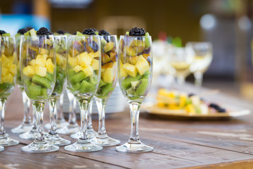 Fresh fruit cuts in champagne glasses