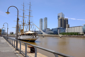 Frigate and Women's bridge in Puerto Madero, Buenos Aires