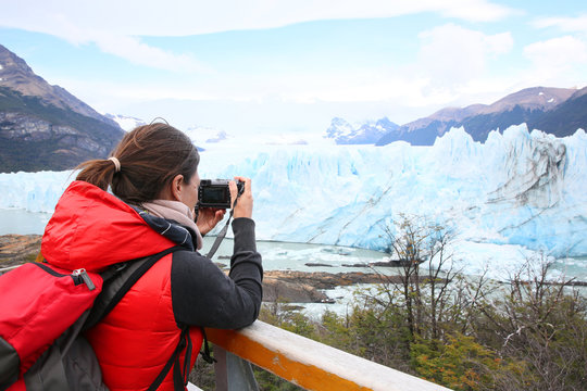 Tourist taking picture of Perito Moreno Glacier