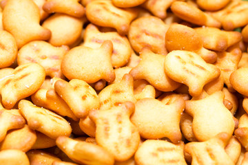 A scaterring of yellow goldfish crackers