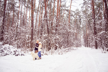 boy and girl holding hands, winter walks in the woods