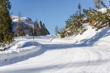 Winding Mountain Road Covered in Snow