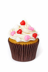 Valentine cupcakes with frosting and hearts. Selective focus.