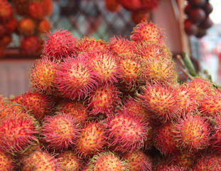 Naklejka na ściany i meble branch fruit rambutan on the market 