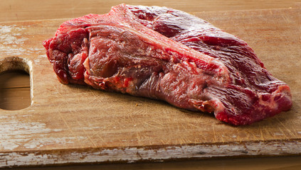 Beef Steak  on a  wooden board.