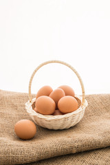 Chicken eggs in the bamboo basket