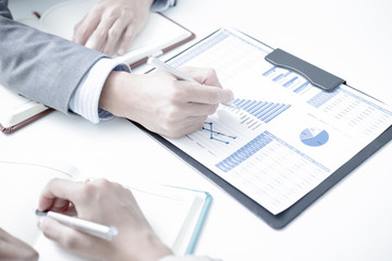 Business people discussing the charts and graphs showing the res