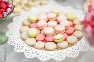 wedding dessert with delicious cakes and macaroons