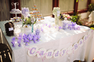 wedding dessert with delicious cakes and macaroons