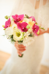 Bride holding a bouquet of beautiful flowers