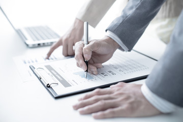 Fototapeta premium Business people discussing the charts and graphs showing the res