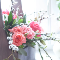 Beautiful fresh flowers in a wooden box, toned photo