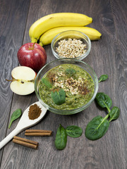 Green smoothie with apples, spinach, banana, germinated buckwhea