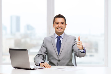 businessman working with laptop in office