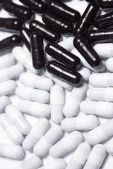 White and black pills