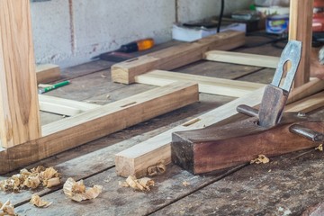 wooden plane in a workshop of the carpenter