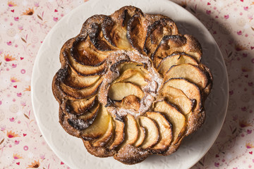 Homemade apple pie over a vintage background