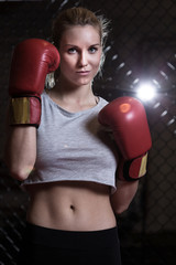 Woman wearing boxing gloves