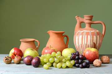 Ceramic dishes and fresh fruit