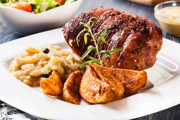 Pork knuckle with fried sauerkraut