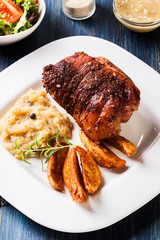 Pork knuckle with fried sauerkraut
