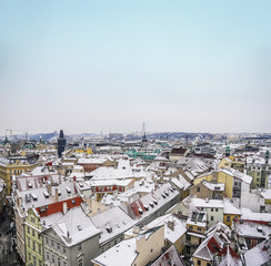 The view over the houses and roofs from the top of Staromestka