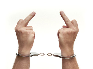 Handcuffed and the finger sign