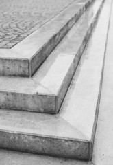 Corner angle of three steps with cobblestones