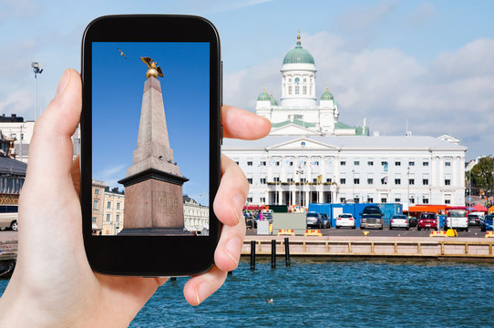 Tourist Taking Photo Of Market Square In Helsinki