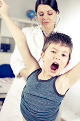 Little boy shouting during medical treatment funny
