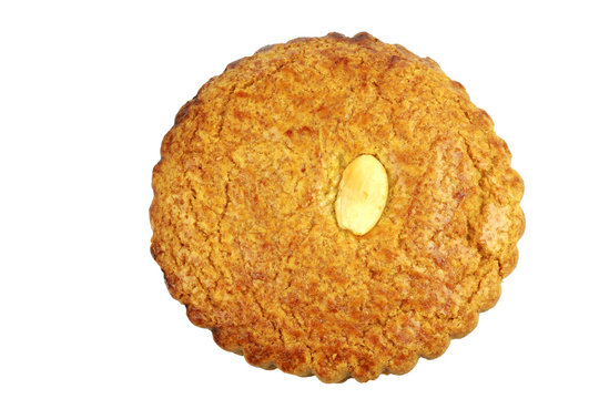 Dutch traditional pastry called"gevulde koek" on a white backgro