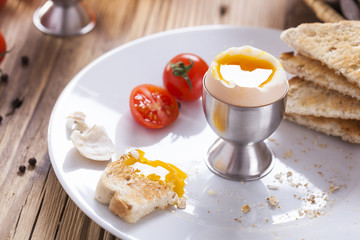 English breakfast on dark wooden table
