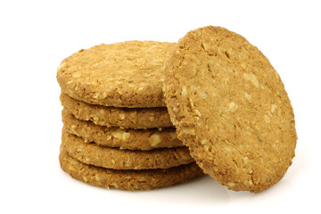 two wholemeal cookies on a white background