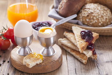 English breakfast on dark wooden table