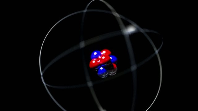 Atom single high energy shake vibrate nucleus proton neutron ele