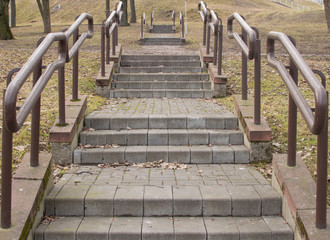 Stone ladder and railing in the park