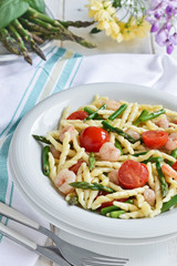 Pasta with asparagus and shrimp. Italian cuisine.