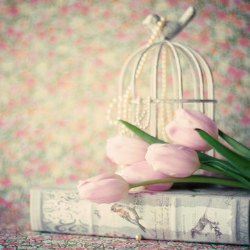 Pink tulips and vintage objects
