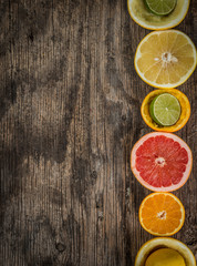 Fototapeta na wymiar Set of sliced citrus fruits lemon, lime, orange, grapefruit with