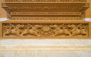 Thai art of wood carving around the temple.