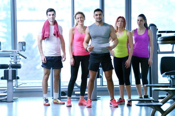 Fototapeta premium Group of people exercising at the gym
