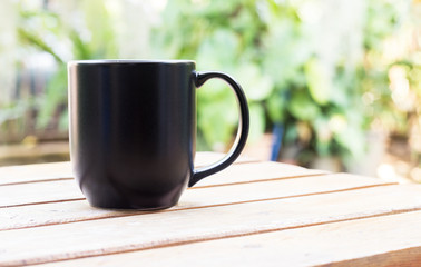 Black Coffee cup in garden