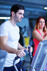 Fototapeta na wymiar man running on the treadmill