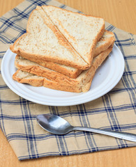 bread on tablecloth breakfast