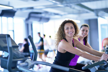Fototapeta premium Group of people running on treadmills