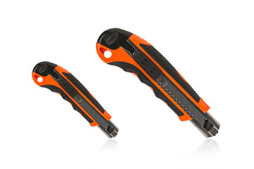 Red and back paper knife or cutter on white background