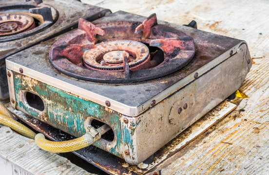 Old gas burner and stove close up