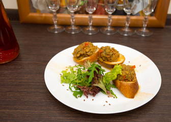 Sandwiches with eggplant, lettuce and arugula