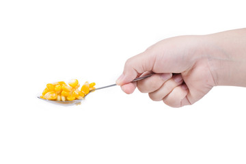 Sweet corn in spoon ready for eat with hand